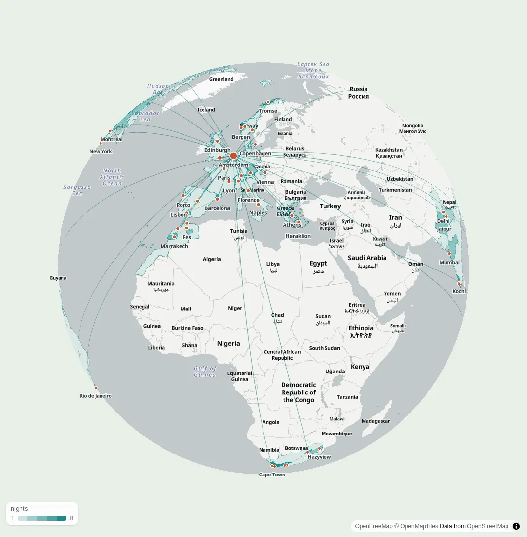 A globe covered in flight routes and shaded countries